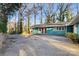 Large concrete patio adjacent to the house at 702 Forest Hill Dr, Shelby, NC 28150
