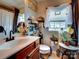 Bathroom with updated vanity, toilet, and decorative shelving at 3005 Golden Dale Ln, Charlotte, NC 28262