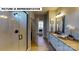 Spa-like bathroom with a walk-in shower and modern vanity at 125 Sari St, Troutman, NC 28166