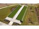 Aerial view of a bocce ball court with benches at 129 Sari St, Troutman, NC 28166