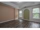 Well-lit bedroom with hardwood floors and neutral walls at 12431 Jessica Pl, Charlotte, NC 28269