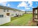 Landscaped backyard with townhomes and deck at 9345 Hamel St, Charlotte, NC 28215