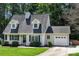 Two-story house with gray roof and attached garage at 4520 Huntington Dr, Gastonia, NC 28056