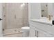 Clean bathroom with a walk-in shower and white vanity at 1031 Seven Sisters Ave, Monroe, NC 28110