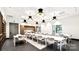 Community room with long tables and chairs, perfect for gatherings at 1031 Seven Sisters Ave, Monroe, NC 28110