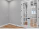 Home office with french doors and hardwood floors at 1031 Seven Sisters Ave, Monroe, NC 28110