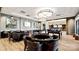 Community game room with pool tables and seating areas at 1031 Seven Sisters Ave, Monroe, NC 28110