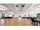 Large community room with hardwood floors and ample seating at 1031 Seven Sisters Ave, Monroe, NC 28110