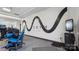 Modern gym with various equipment and large wall art at 1031 Seven Sisters Ave, Monroe, NC 28110