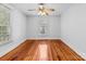 Spacious bedroom featuring hardwood floors and large windows at 405 7Th St, Spencer, NC 28159