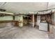 Unfinished basement with exposed brick and ductwork at 405 7Th St, Spencer, NC 28159