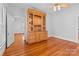 Hardwood floor dining room with built-in hutch at 405 7Th St, Spencer, NC 28159