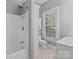 Clean bathroom with shower/tub combo, toilet and vanity at 405 7Th St, Spencer, NC 28159