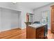Kitchenette with wood cabinets and a double sink at 405 7Th St, Spencer, NC 28159