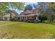 House with a large green yard and walkway at 405 7Th St, Spencer, NC 28159