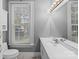 Bathroom with double vanity and toilet at 405 7Th St, Spencer, NC 28159
