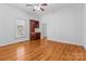 Bright dining room with hardwood floors and built-in cabinetry at 405 7Th St, Spencer, NC 28159