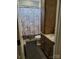 Clean bathroom with wood cabinets and granite countertop at 3486 Mason Spring Dr, Lincolnton, NC 28092