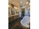 Luxurious bathroom with double vanities and a soaking tub at 3486 Mason Spring Dr, Lincolnton, NC 28092