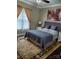 Spacious bedroom with a comfortable bed and large window at 3486 Mason Spring Dr, Lincolnton, NC 28092