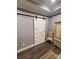 Modern barn door adds a touch of rustic charm to the room at 3486 Mason Spring Dr, Lincolnton, NC 28092