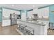 Modern kitchen with white cabinets and granite countertops at 7278 Waterwheel St, Concord, NC 28025