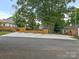 Gravel parking area and modern wood fence at 2015 Pinckney Ave, Charlotte, NC 28205