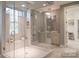 Luxurious bathroom featuring a walk-in shower, soaking tub, and elegant fixtures at 2008 Stratford Ave, Charlotte, NC 28205