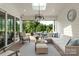 Relaxing sunroom with ample natural light and access to the backyard at 2008 Stratford Ave, Charlotte, NC 28205