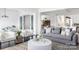 Spacious living room with comfortable seating and views into the kitchen and dining areas at 2008 Stratford Ave, Charlotte, NC 28205