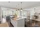 Open concept kitchen with large island, Gathering and dining area views at 2008 Stratford Ave, Charlotte, NC 28205