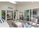 Sunroom features a comfortable seating area and views of the backyard at 2008 Stratford Ave, Charlotte, NC 28205