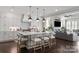 Open concept kitchen with island and Gathering room view at 2008 Stratford Ave, Charlotte, NC 28205