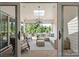 Bright sunroom with patio doors leading to the backyard at 2008 Stratford Ave, Charlotte, NC 28205