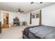 Large bedroom with a view of the kitchen and a ceiling fan at 210 Pinkney Rd, Dallas, NC 28034