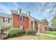 Brick townhouse with a charming front porch at 9408 Vicksburg Park Ct, Charlotte, NC 28210