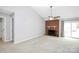 Living room with fireplace and vaulted ceiling at 9408 Vicksburg Park Ct, Charlotte, NC 28210