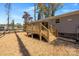 Wooden deck with stairs leading to the backyard at 1128 Bethesda Rd, Statesville, NC 28677