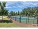 Well-maintained tennis courts in a community setting at 14008 Little Spring Ct # 391, Charlotte, NC 28278
