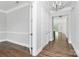 Bright hallway with hardwood floors and access to other rooms at 14008 Little Spring Ct # 391, Charlotte, NC 28278