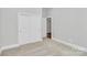 Simple bedroom with carpet, double door closet and neutral walls at 14008 Little Spring Ct # 391, Charlotte, NC 28278
