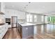 Modern kitchen featuring stainless steel appliances and a large island at 14008 Little Spring Ct # 391, Charlotte, NC 28278