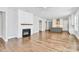 Spacious living room with hardwood floors, fireplace and open to kitchen at 14008 Little Spring Ct # 391, Charlotte, NC 28278
