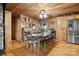 Rustic dining area with wooden table and bench seating at 4796 Dewitt Rd, Blackstock, SC 29014