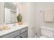 Bathroom boasts a vanity, toilet, and shower at 13832 Cypress Woods Dr, Huntersville, NC 28078