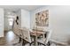 Bright dining room with hardwood floors and large artwork at 2325 Hedgecliff Rd # 13, Kannapolis, NC 28083