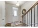 Bright entryway with stairs and decorative mirror at 2325 Hedgecliff Rd # 13, Kannapolis, NC 28025