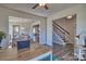 Home office space with built-in workspace overlooking the dining and kitchen area at 311 Coronado Ave # 62, Matthews, NC 28104