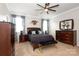 Main bedroom with carpeted floors and ensuite bathroom at 14217 Ridgewater Way, Charlotte, NC 28278