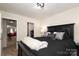 Bedroom with a double bed and access to a walk-in closet at 14217 Ridgewater Way, Charlotte, NC 28278